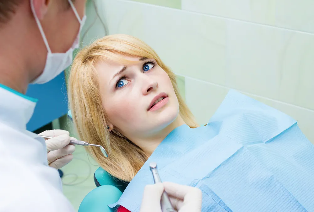 fearful patient looking at doctor