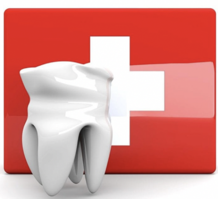 red cross symbol and tooth model